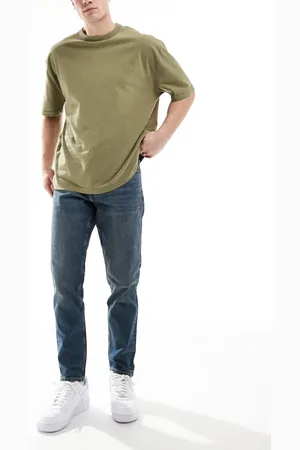 ASOS Tapered jeans med stræk i blå dark wash