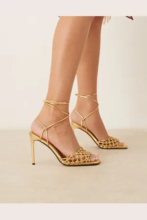 ASOS Nadine - Guldfarvede sandaler med hæl og knudedesign