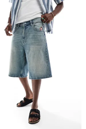 Hollister Mellemvaskede superposede denimshorts med broderi