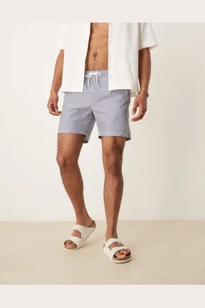 MANGO Badeshorts med striber i bæk-og-bølge-stof