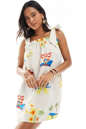 Pieces® Cremehvid smock-minikjole med cami-bindestropper og ferieprint-Gul