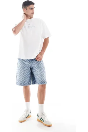ASOS Lange blå denim-jorts med toning og zebra-laserprint