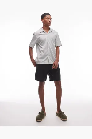 ARKET Sorte shorts med flad front og skrå lommer i hør