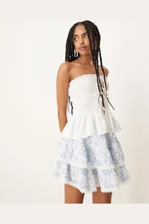 Gina Tricot Lagdelt boho-mininederdel med flæser og blomstermønster-Blå
