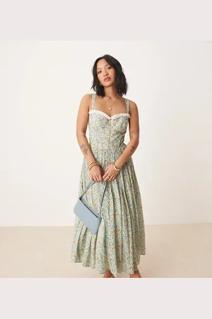 Lace & Beads Blå midikjole med korsetdetaljer og småblomstret print i bomuld