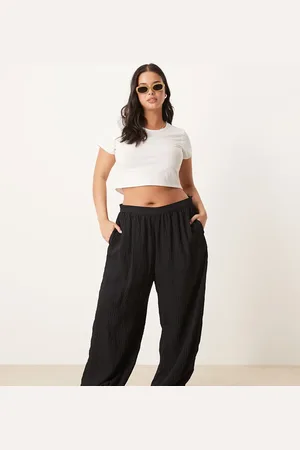 ASOS Curve - Sorte bukser med manchetter og teksturerede striber