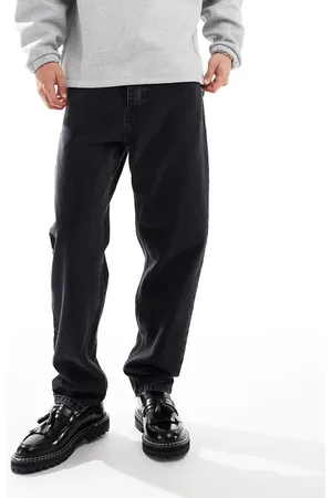 Carhartt Newel - Sorte afslappede jeans i tapered pasform