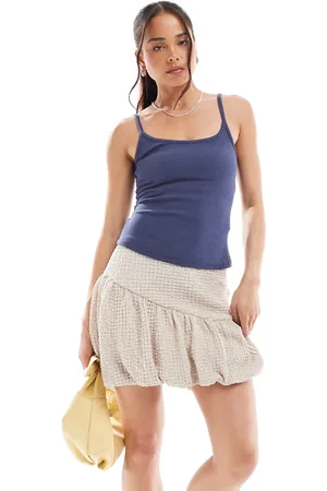 VERO MODA Beige mininederdel med tekstur og puffball-kant-Hvid