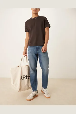ASOS Blå tapered jeans i lys vask med vintage-skær