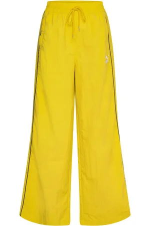 PUMA T7 Play.paris. Track Pants Wv Sport Women Sport Clothing Sport Pants Sport Sweatpants Yellow