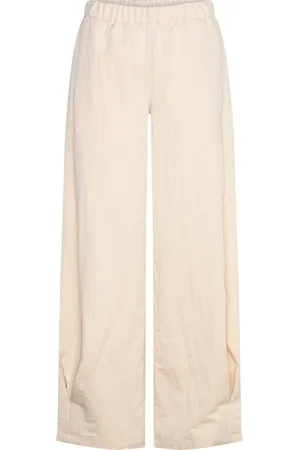 MANGO Pleated Jogger Trousers Bottoms Trousers Joggers Beige