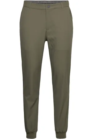 PUMA Dealer Jogger Sport Sport Pants Khaki Green