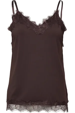 Freequent Top From Freequent In A Light Material. The Top Has A Simple Silhouette With Nar Brown