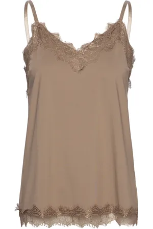 Freequent Top From Freequent In A Light Material. The Top Has A Simple Silhouette With Nar Beige