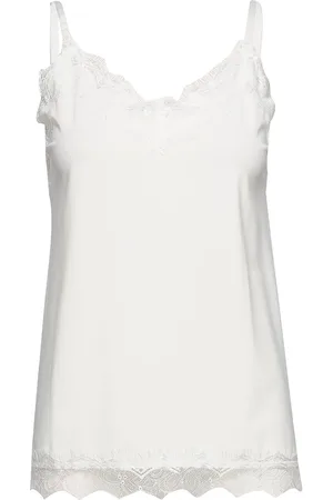 Freequent Top From Freequent In A Light Material. The Top Has A Simple Silhouette With Nar White
