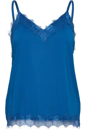Freequent Top From Freequent In A Light Material. The Top Has A Simple Silhouette With Nar Blue
