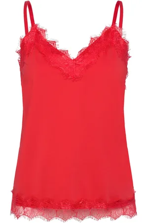 Freequent Top From Freequent In A Light Material. The Top Has A Simple Silhouette With Nar Red