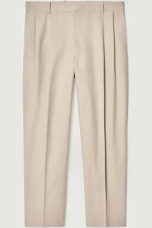 COS Relaxed Pleated Cotton Tapered Trousers in