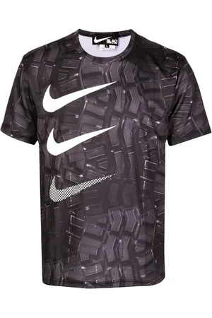 Comme des Garçons T-shirt med grafisk Swoosh-tryk