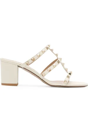 VALENTINO GARAVANI Rockstud-sandaler i læder med en åben tå, en indersål i læder, en mellemhøj blokhæl og nitte-udsmykninger.