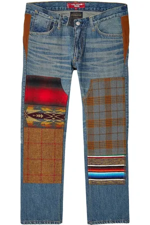 JUNYA WATANABE Jeans med mellemhøj talje og patchwork