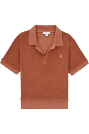 Sporty & Rich Polo i frotté med broderet logo