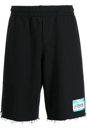 Vetements Denimshorts med frynser og logo