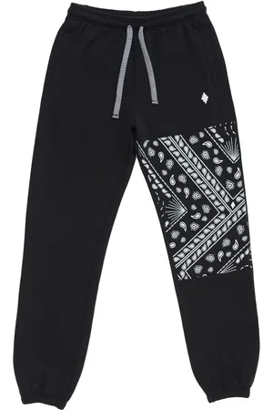 MARCELO BURLON Joggingbukser med bandana-tryk og paneler
