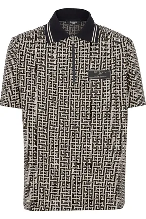 Balmain Polo med jacquard-monogram og lynlås
