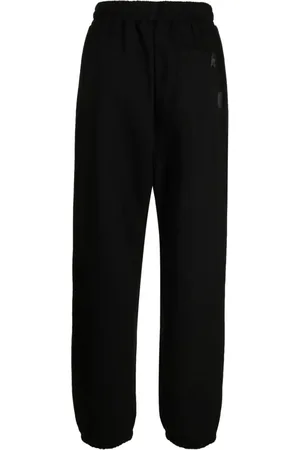 Izzue Slip on-joggingbukser med broderet logo