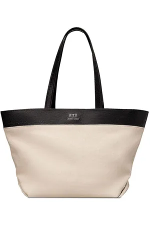 Ami Tote med paneler og logoplade