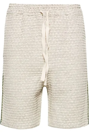 Drôle de Monsieur Shorts i bouclé med flettet detalje