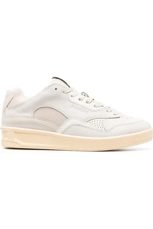 Jil Sander Sneakers med præget logo og snøre