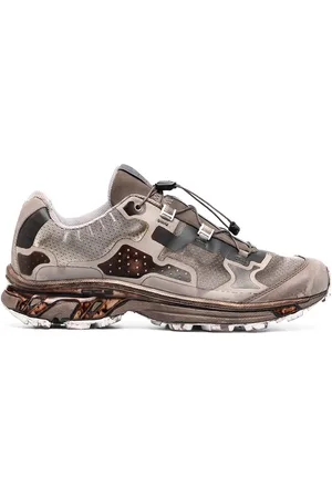 11 BY BORIS BIDJAN SABERI Low-top sneakers med slitageeffekt