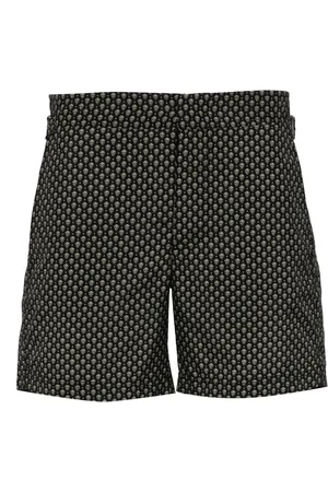 Alexander McQueen Badeshorts med dødningehovedtryk og stropper i siden