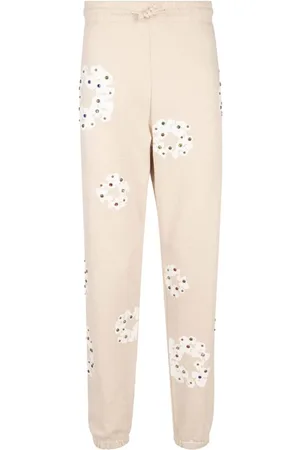 DENIM TEARS Joggingbukser med rhinsten og Wreath-tryk