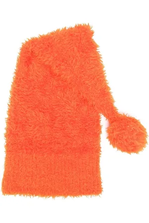 Moschino Hue med pels-effekt og pompon fra 00