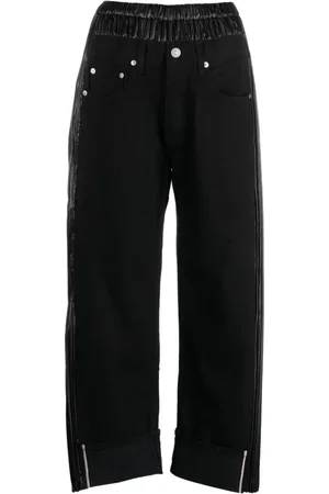 JUNYA WATANABE Cropped jeans med paneler og logomærke