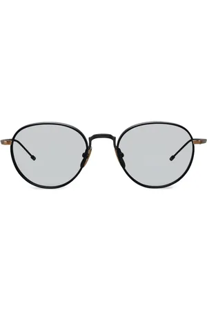 Thom Browne Solbriller med tonet glas og rundt stel