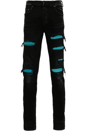 AMIRI Skinny-jeans med ruskindsudsmykning