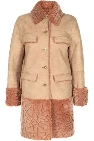 CHANEL 2001 mouton pelsfrakke med perleknapper