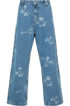 Carhartt Stamp jeans med smalle ben og grafisk tryk