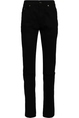 Saint Laurent Jeans med smal pasform og slitageeffekt