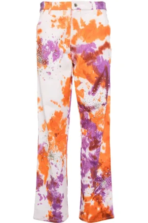 Des Phemmes Jeans med krystaludsmykning og batiktryk