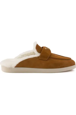 Prada Mules med logoapplikation