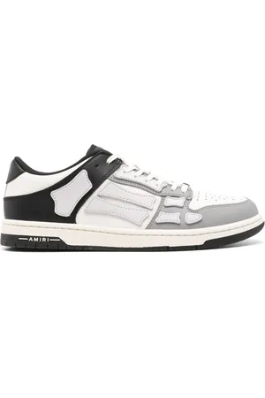 AMIRI Tofarvede sneakers i læder med dødningehoved