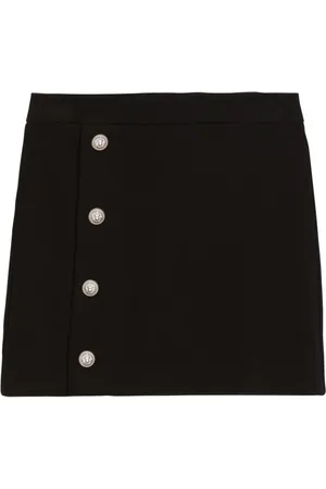 Balmain Kort strikket nederdel med præget logo