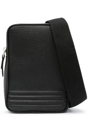 DELAGE Sling crossbody-taske i kanvas
