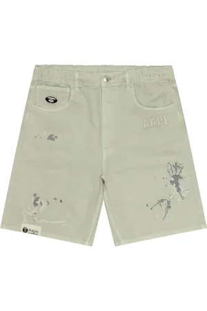 A Bathing Ape Denimshorts med malingssprøjt