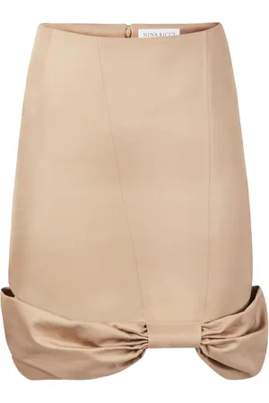 Nina Ricci Mellemlang peplum-nederdel med sløjfe